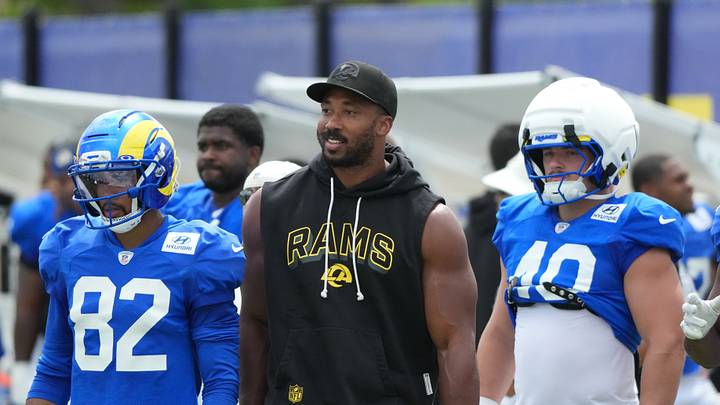 Aug 11, 2026; Woodland Hills, CA, USA; Los Angeles Rams wide receiver Tyler Scott (82), defensive end Myles Garrett (center) and defensive end Daniel Rickert (40) watch during a joint practice against the Dallas Cowboys at the Rams Practice Facility. Mandatory Credit: Kirby Lee-Imagn Images