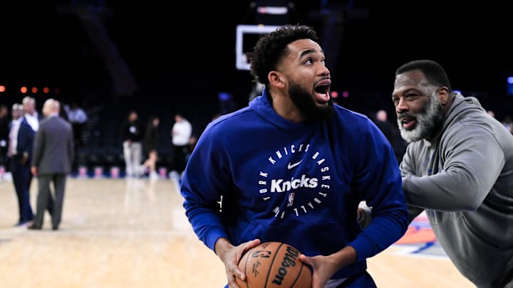 Oct 28, 2024; New York, New York, USA; New York Knicks center Karl-Anthony Towns (32) warms up with assistant coach Mark Bryant before a game against the Cleveland Cavaliers at Madison Square Garden. Mandatory Credit: John Jones-Imagn Images