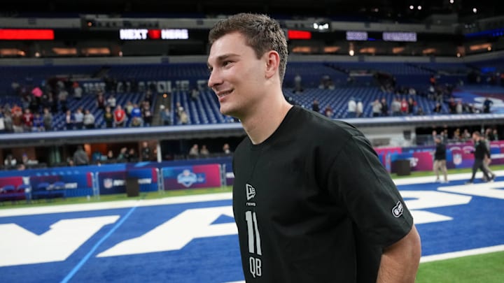 Feb 28, 2026; Indianapolis, IN, USA; Indiana quarterback Fernando Mendoza (QB11) looks on during the NFL Scouting Combine at Lucas Oil Stadium. Mandatory Credit: Kirby Lee-Imagn Images
