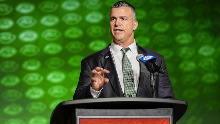 Jul 25, 2023; Charlotte, NC, USA;  Miami head coach Mario Cristobal answers questions during ACC Media Days at The Westin Charlotte. Mandatory Credit: Jim Dedmon-Imagn Images