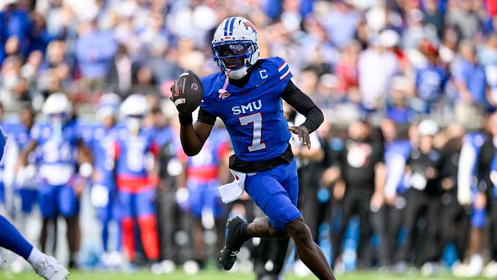 Nov 22, 2025; Dallas, Texas, USA; SMU Mustangs quarterback Kevin Jennings (7) runs with the ball during the game between the Mustangs and the Cardinals at Gerald J. Ford Stadium. Mandatory Credit: Jerome Miron-Imagn Images Nov 22, 2025; Dallas, Texas, USA; SMU Mustangs quarterback Kevin Jennings (7) runs with the ball during the game between the Mustangs and the Cardinals at Gerald J. Ford Stadium. Mandatory Credit: Jerome Miron-Imagn Images