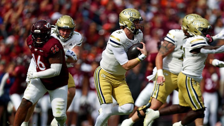 Oct 26, 2024; Blacksburg, Virginia, USA; Georgia Tech Yellow Jackets quarterback Zach Pyron (5) runs the ball during the first quarter against the Virginia Tech Hokies at Lane Stadium. Mandatory Credit: Peter Casey-Imagn Images