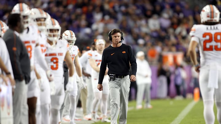 Nov 9, 2024; Fort Worth, Texas, USA; Oklahoma State Cowboys head coach Mike Gundy walks down the sidelines  in the game against the TCU Horned Frogs at Amon G. Carter Stadium. Mandatory Credit: Tim Heitman-Imagn Images