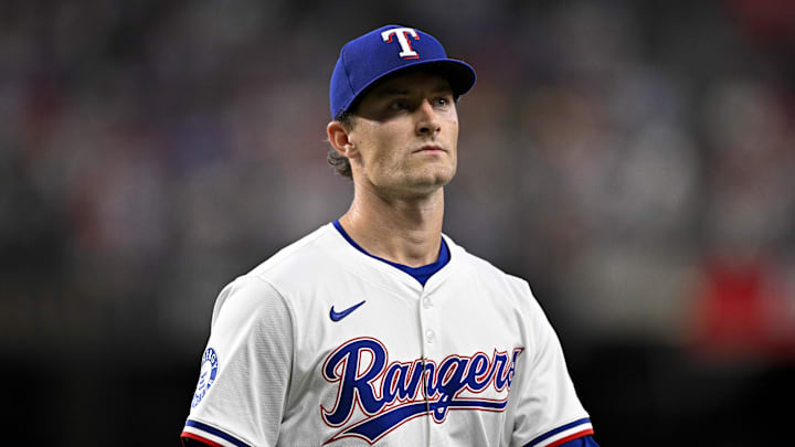 Jun 19, 2025; Arlington, Texas, USA; Texas Rangers relief pitcher Jacob Latz (67) leaves the game against the Kansas City Royals during the seventh inning at Globe Life Field. 