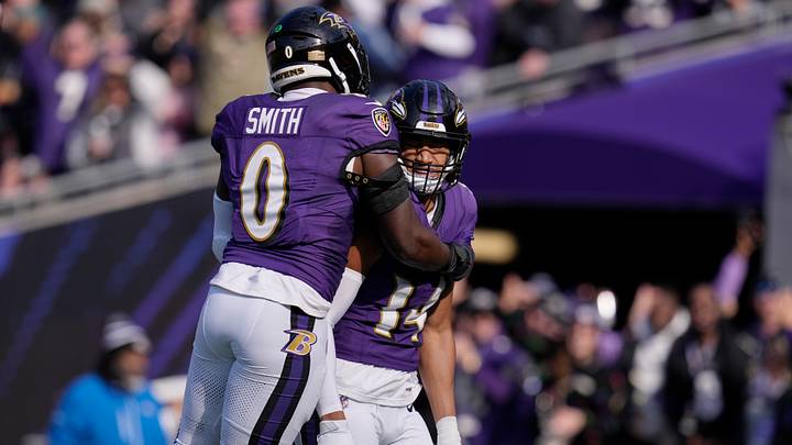 Nov 12, 2023; Baltimore, Maryland, USA; Baltimore Ravens safety Kyle Hamilton (14) celebrates with linebacker Roquan Smith (0) after scoring a touchdown against the Cleveland Browns during the first quarter at M&T Bank Stadium. Mandatory Credit: Jessica Rapfogel-USA TODAY Sports Nov 12, 2023; Baltimore, Maryland, USA; Baltimore Ravens safety Kyle Hamilton (14) celebrates with linebacker Roquan Smith (0) after scoring a touchdown against the Cleveland Browns during the first quarter at M&T Bank Stadium. Mandatory Credit: Jessica Rapfogel-USA TODAY Sports