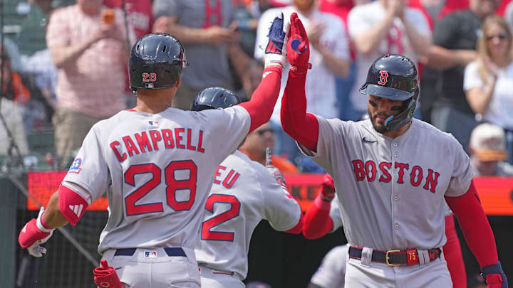 Apr 3, 2025; Baltimore, Maryland, USA; Boston Red Sox second baseman Kristian Campbell (28) greeted by catcher Carlos Narvaez (75) during the second inning following his two run home run against the Baltimore Orioles at Oriole Park at Camden Yards. Mandatory Credit: Mitch Stringer-Imagn Images
