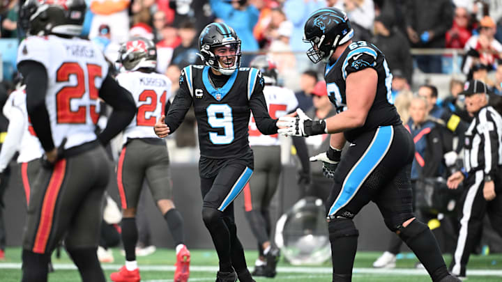 Dec 21, 2025; Charlotte, North Carolina, USA; Carolina Panthers quarterback Bryce Young (9) celebrates with center Austin Corbett (63) during the second half against the Tampa Bay Buccaneers at Bank of America Stadium. Mandatory Credit: Bob Donnan-Imagn Images Dec 21, 2025; Charlotte, North Carolina, USA; Carolina Panthers quarterback Bryce Young (9) celebrates with center Austin Corbett (63) during the second half against the Tampa Bay Buccaneers at Bank of America Stadium. Mandatory Credit: Bob Donnan-Imagn Images