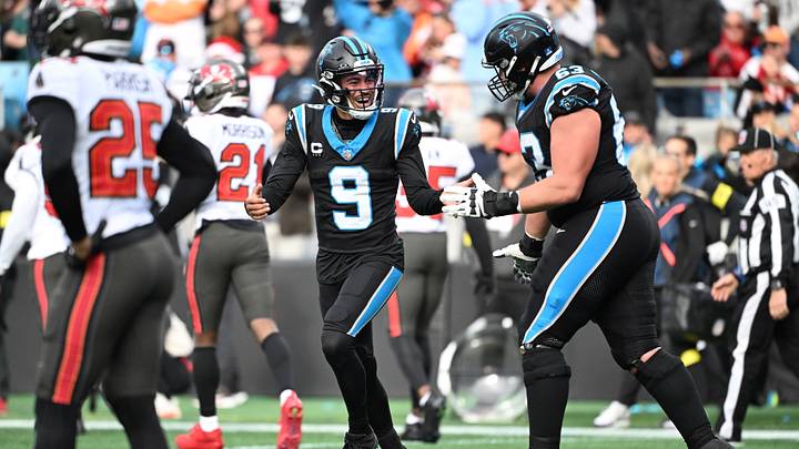 Carolina Panthers quarterback Bryce Young (9) celebrates with center Austin Corbett (63) during the second half 