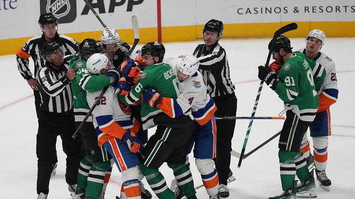 Oct 25, 2026; Dallas, Texas, USA;  The New York Islanders and Dallas Stars scrape during the third period at American Airlines Center. Mandatory Credit: Raymond Carlin III-Imagn Images