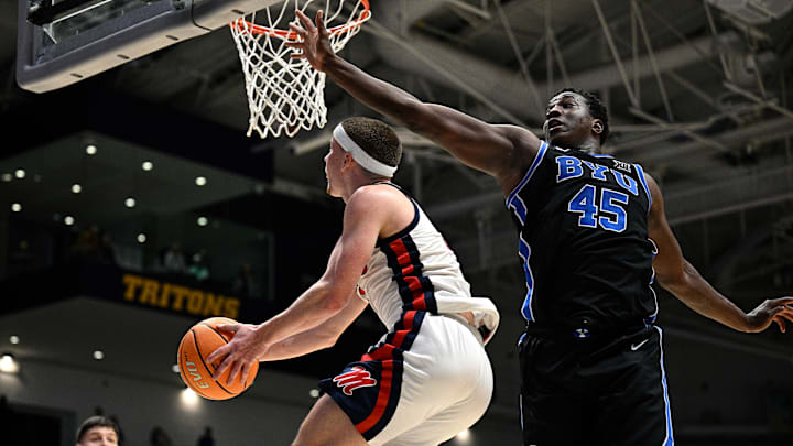 Fouss contests an acrobatic layup against Ole Miss