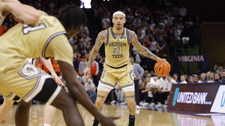 Feb 8, 2025; Charlottesville, Virginia, USA; Georgia Tech Yellow Jackets forward Duncan Powell (31) prepares to pass the ball against the Virginia Cavaliers during the first half at John Paul Jones Arena. Mandatory Credit: Amber Searls-Imagn Images