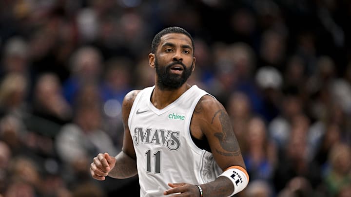 Jan 22, 2025; Dallas, Texas, USA; Dallas Mavericks guard Kyrie Irving (11) runs back up the court during the second half against the Minnesota Timberwolves at the American Airlines Center. Mandatory Credit: Jerome Miron-Imagn Images