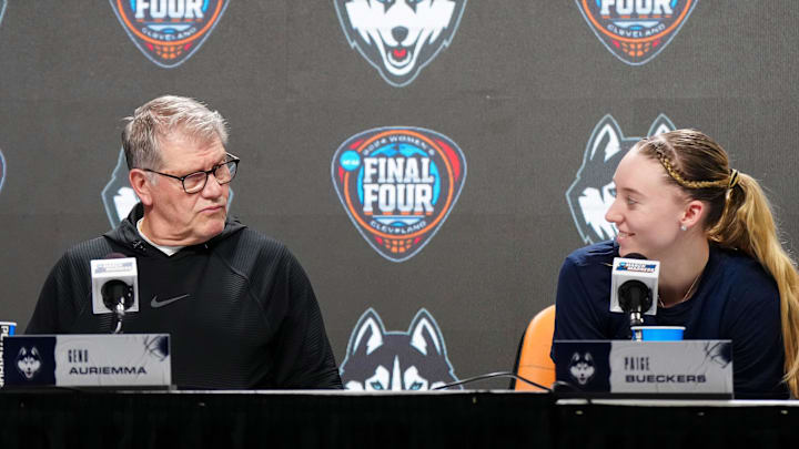 Apr 4, 2024; Cleveland, OH, USA; UConn Huskies coach Geno Auriemma (left) and guard Paige Bueckers during press conference at Rocket Mortgage FieldHouse. Mandatory Credit: Kirby Lee-Imagn Images Apr 4, 2024; Cleveland, OH, USA; UConn Huskies coach Geno Auriemma (left) and guard Paige Bueckers during press conference at Rocket Mortgage FieldHouse. Mandatory Credit: Kirby Lee-Imagn Images