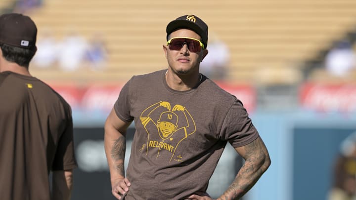 Oct 5, 2024; Los Angeles, California, USA; San Diego Padres third baseman Manny Machado (13) looks on before playing against the Los Angeles Dodgers in game one of the NLDS for the 2024 MLB Playoffs at Dodger Stadium. Mandatory Credit: Jayne Kamin-Oncea-Imagn Images