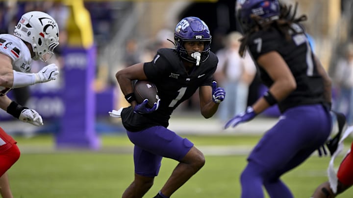 Nov 29, 2025; Fort Worth, Texas, USA; TCU Horned Frogs wide receiver Eric McAlister (1) runs with the ball during the game between the Horned Frogs and the Bearcats at Amon G. Carter Stadium. Mandatory Credit: Jerome Miron-Imagn Images