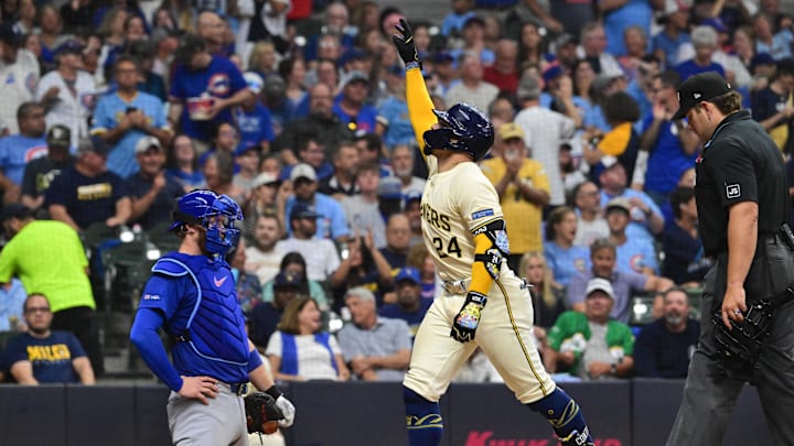 Jul 30, 2025; Milwaukee, Wisconsin, USA; Milwaukee Brewers catcher William Contreras (24) reacts after hitting a solo home run in the fourth inning as Chicago Cubs catcher Carson Kelly (15) looks on at American Family Field. Mandatory Credit: Benny Sieu-Imagn Images