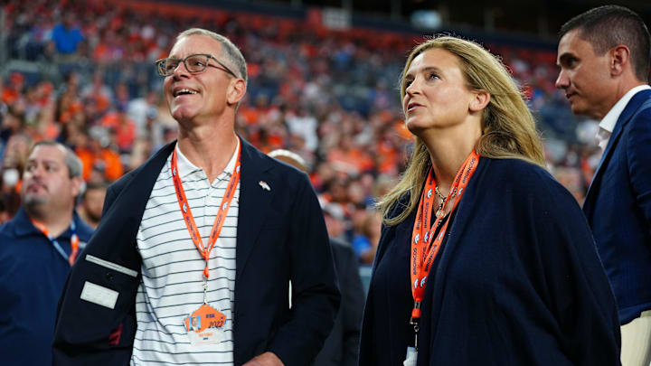 Denver Broncos CEO Greg Penner and wife Carrie Walton Penner 