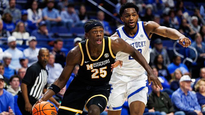 Jan 7, 2026; Lexington, Kentucky, USA; Missouri Tigers forward Mark Mitchell (25) drives to the basket around Kentucky Wildcats forward Mouhamed Dioubate (23) during the first half at Rupp Arena at Central Bank Center. Mandatory Credit: Jordan Prather-Imagn Images Jan 7, 2026; Lexington, Kentucky, USA; Missouri Tigers forward Mark Mitchell (25) drives to the basket around Kentucky Wildcats forward Mouhamed Dioubate (23) during the first half at Rupp Arena at Central Bank Center. Mandatory Credit: Jordan Prather-Imagn Images