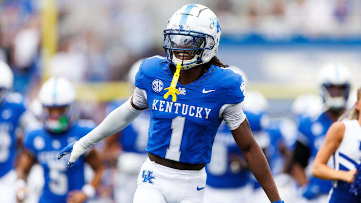 Sep 21, 2024; Lexington, Kentucky, USA; Kentucky Wildcats defensive back Maxwell Hairston (1) runs onto the field before the game against the Ohio Bobcats at Kroger Field. Mandatory Credit: Jordan Prather-Imagn Images