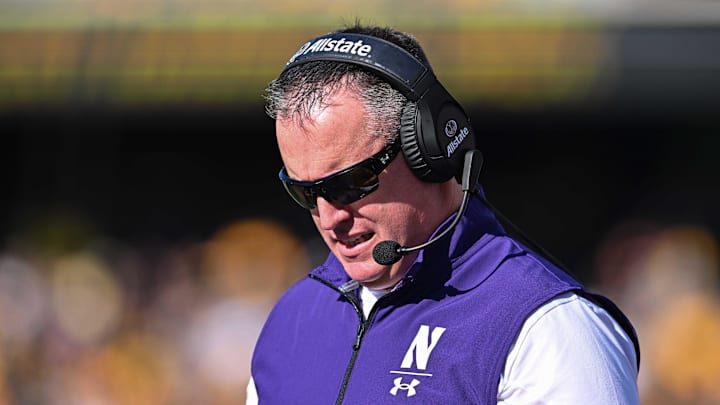 Oct 29, 2022; Iowa City, Iowa, USA; Northwestern Wildcats head coach Pat Fitzgerald looks on during the game against the Iowa Hawkeyes at Kinnick Stadium. Mandatory Credit: Jeffrey Becker-Imagn Images