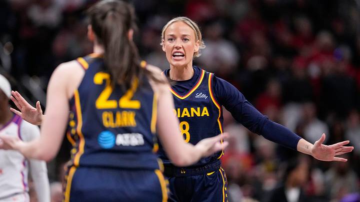 Indiana Fever guard Sophie Cunningham (8) yells to Indiana Fever guard Caitlin Clark (22) on Monday, June 22, 2026, during the game at Gainbridge Fieldhouse in Indianapolis. The Indiana Fever defeated the Phoenix Mercury, 86-77.