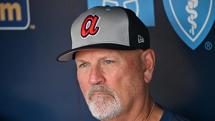 Jul 28, 2025; Kansas City, Missouri, USA;  Atlanta Braves manager Brian Snitker (43) looks on during batting practice before a game against the Kansas City Royals at Kauffman Stadium. Mandatory Credit: Peter Aiken-Imagn Images