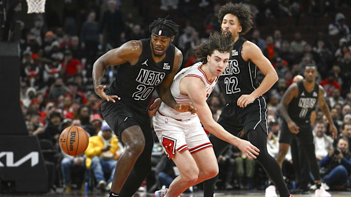 Dec 2, 2024; Chicago, Illinois, USA; Chicago Bulls guard Josh Giddey (3) loses the ball to Brooklyn Nets center Day'Ron Sharpe (20) and forward Jalen Wilson (22) during the second half at the United Center. Mandatory Credit: Matt Marton-Imagn Images