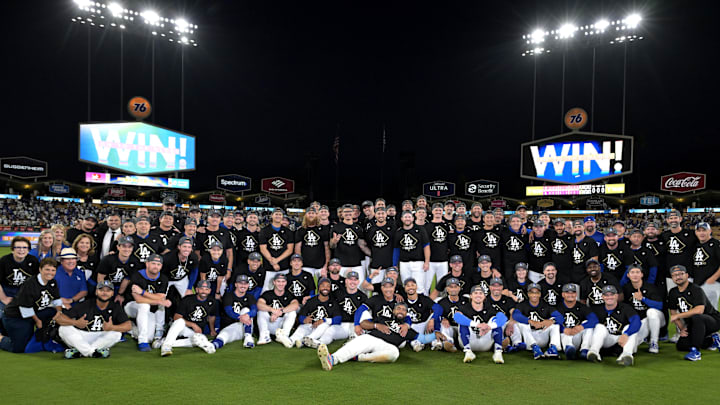 Oct 9, 2025; Los Angeles, California, USA; the Los Angeles Dodgers celebrate with a team photo after defeating the Philadelphia Phillies in game four of the NLDS round for the 2025 MLB playoffs at Dodger Stadium. Mandatory Credit: Jayne Kamin-Oncea-Imagn Images