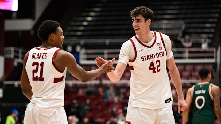 Jan 22, 2025; Stanford, California, USA; Stanford Cardinal forward Maxime Raynaud (42) and guard Jaylen Blakes (21) celebrate against the Miami (FL) Hurricanes in the second half at Maples Pavilion. Mandatory Credit: Eakin Howard-Imagn Images Jan 22, 2025; Stanford, California, USA; Stanford Cardinal forward Maxime Raynaud (42) and guard Jaylen Blakes (21) celebrate against the Miami (FL) Hurricanes in the second half at Maples Pavilion. Mandatory Credit: Eakin Howard-Imagn Images