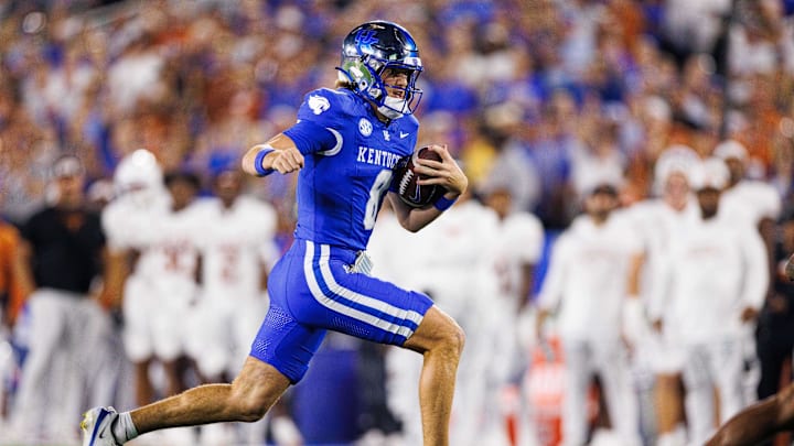 Oct 18, 2025; Lexington, Kentucky, USA; Kentucky Wildcats quarterback Cutter Boley (8) runs the ball during the first quarter against the Texas Longhorns at Kroger Field. Mandatory Credit: Jordan Prather-Imagn Images Oct 18, 2025; Lexington, Kentucky, USA; Kentucky Wildcats quarterback Cutter Boley (8) runs the ball during the first quarter against the Texas Longhorns at Kroger Field. Mandatory Credit: Jordan Prather-Imagn Images