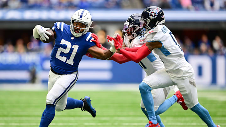 Oct 8, 2023; Indianapolis, Indiana, USA; Indianapolis Colts running back Zack Moss (21) evades