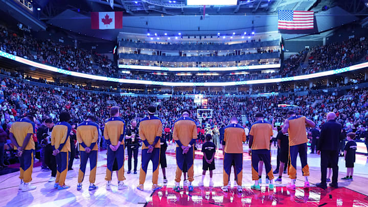 Nov 18, 2024; Toronto, Ontario, CAN; The Indiana Pacers players stand during the national anthems before a game against the Toronto Raptors at Scotiabank Arena. Mandatory Credit: Nick Turchiaro-Imagn Images