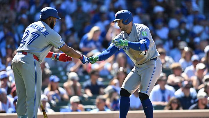 Toronto Blue Jays designated hitter George Springer celebrates a home run with first baseman Vladimir Guerrero Jr.