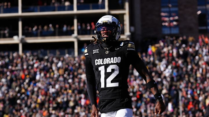 Nov 29, 2024; Boulder, Colorado, USA; Colorado Buffaloes wide receiver Travis Hunter (12) reacts in the first quarter against the Oklahoma State Cowboys at Folsom Field. Mandatory Credit: Ron Chenoy-Imagn Images Nov 29, 2024; Boulder, Colorado, USA; Colorado Buffaloes wide receiver Travis Hunter (12) reacts in the first quarter against the Oklahoma State Cowboys at Folsom Field. Mandatory Credit: Ron Chenoy-Imagn Images