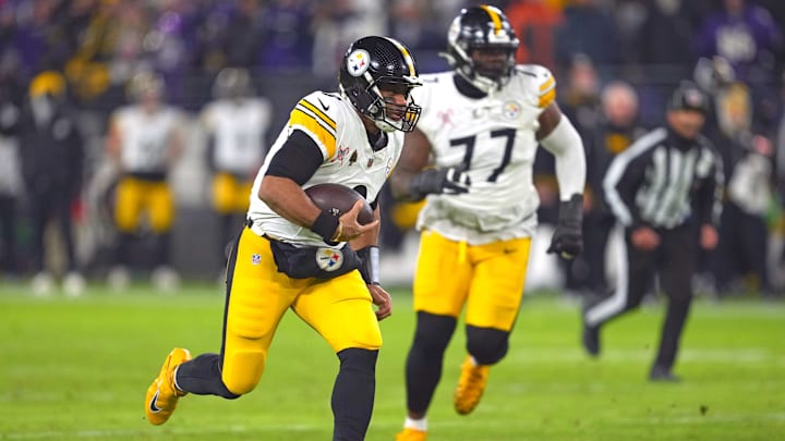 Dec 21, 2024; Baltimore, Maryland, USA; Pittsburgh Steelers quarterback Russell Wilson (3) runs for a gain before fumbling during the second quarter against the Baltimore Ravens against the at M&T Bank Stadium. Mandatory Credit: Mitch Stringer-Imagn Images