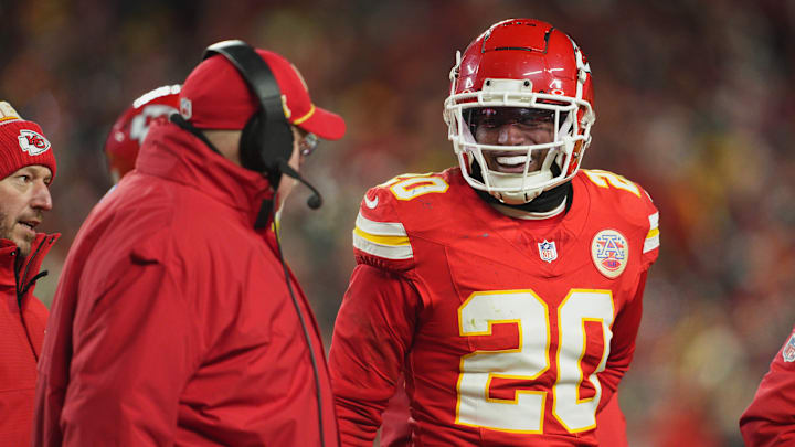 Jan 18, 2025; Kansas City, Missouri, USA; Kansas City Chiefs head coach Andy Reid (left) talks with safety Justin Reid (20) during the fourth quarter of a 2025 AFC divisional round game against the Houston Texans at GEHA Field at Arrowhead Stadium. Mandatory Credit: Jay Biggerstaff-Imagn Images
