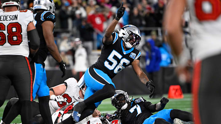 Dec 1, 2024; Charlotte, North Carolina, USA;  Carolina Panthers linebacker Trevin Wallace (56) reacts in overtime at Bank of America Stadium. Mandatory Credit: Bob Donnan-Imagn Images
