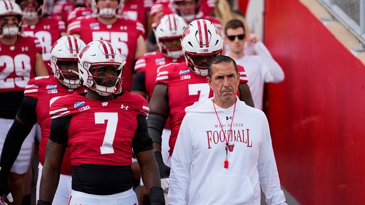 Sep 12, 2026; Madison, Wisconsin, USA;  Wisconsin Badgers head coach Luke Fickell leads the team onto the field for warmups prior to the game against the Western Illinois Leathernecks at Camp Randall Stadium. Mandatory Credit: Jeff Hanisch-Imagn Images