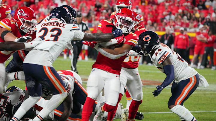 Aug 22, 2024; Kansas City, Missouri, USA; Kansas City Chiefs running back Keaontay Ingram (30) runs the ball as Chicago Bears cornerback Ro Torrence (33) defends during the game at GEHA Field at Arrowhead Stadium. Mandatory Credit: Denny Medley-Imagn Images Aug 22, 2024; Kansas City, Missouri, USA; Kansas City Chiefs running back Keaontay Ingram (30) runs the ball as Chicago Bears cornerback Ro Torrence (33) defends during the game at GEHA Field at Arrowhead Stadium. Mandatory Credit: Denny Medley-Imagn Images