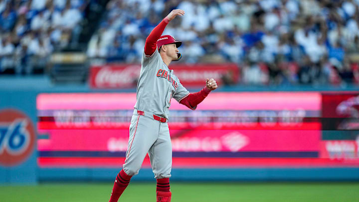 Cincinnati Reds right fielder Austin Hays (12) celebrates an RBI double in the first inning of the MLB National League Wild Card Game 2 between the Los Angeles Dodgers and the Cincinnati Reds at Dodger Stadium in Los Angeles on Wednesday, Oct. 1, 2025. The Reds were eliminated from the postseason with an 8-4 loss to the reining World Series Champions La Dodgers.