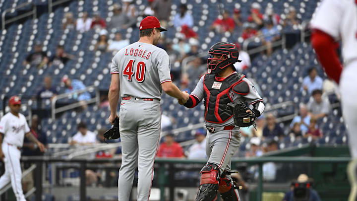 Jul 23, 2025; Washington, District of Columbia, USA; Cincinnati Reds starting pitcher Nick Lodolo (40) is congratulated by catcher Jose Trevino (35) after throwing a complete game shutout against the Washington Nationals at Nationals Park. Mandatory Credit: Brad Mills-Imagn Images