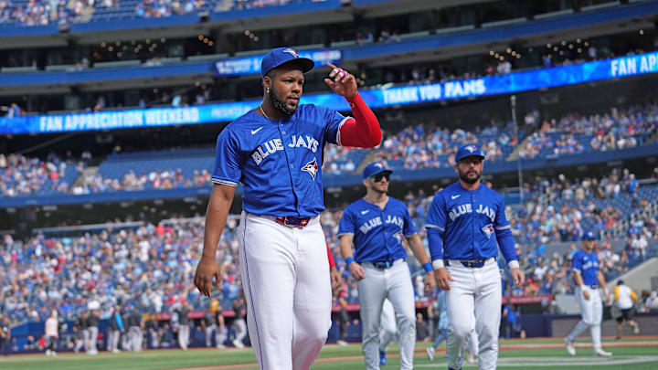 Toronto Blue Jays designated hitter Vladimir Guerrero Jr. (27) walks back to the dugout before the start of a game against the Miami Marlins at Rogers Centre on Sept 29.