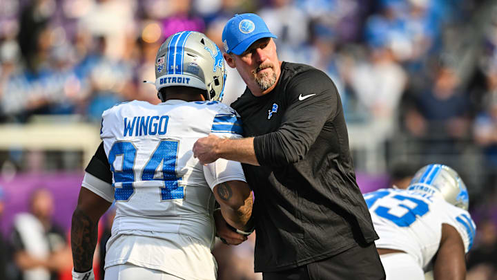 Detroit Lions head coach Dan Campbell greets defensive tackle Mekhi Wingo (94). Detroit Lions head coach Dan Campbell greets defensive tackle Mekhi Wingo (94).