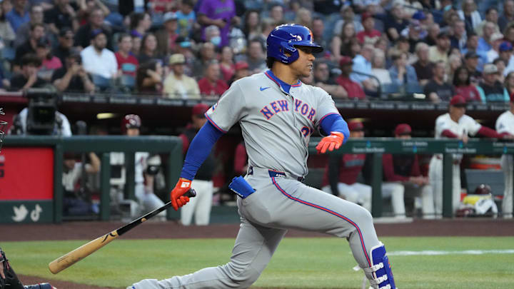 New York Mets outfielder Juan Soto (22) hits against the Arizona Diamondbacks in the first inning at Chase Field on May 6.