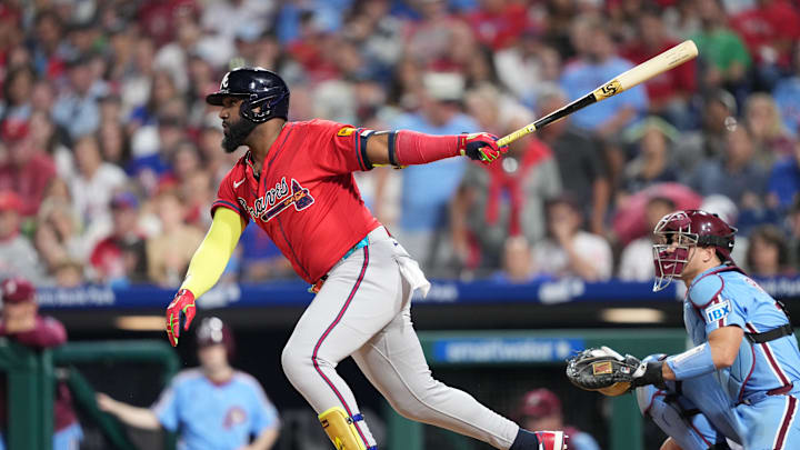 Aug 28, 2025; Philadelphia, Pennsylvania, USA; Atlanta Braves designated hitter Marcell Ozuna (20) hits a single against the Philadelphia Phillies in the seventh inning at Citizens Bank Park. Mandatory Credit: Kyle Ross-Imagn Images
