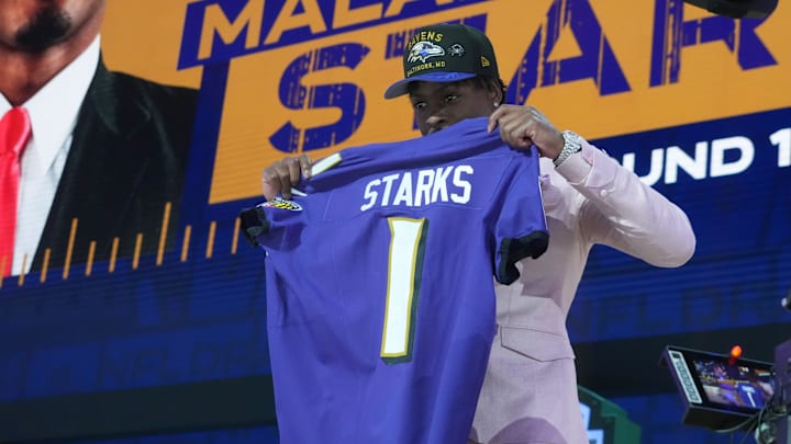 Apr 24, 2025; Green Bay, WI, USA; NFL commissioner Roger Goodell with Georgia Bulldogs safety Malaki Starks after he is selected by the Baltimore Ravens as the number 27 pick in the first round of the 2025 NFL Draft at Lambeau Field. Mandatory Credit: Kirby Lee-Imagn Images