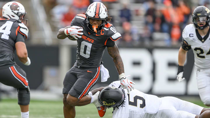 Oct 11, 2025; Corvallis, Oregon, USA; Oregon State Beavers running back Anthony Hankerson (0) runs the ball during the second half against the Wake Forest Demon Deacons at Reser Stadium. Mandatory Credit: Craig Strobeck-Imagn Images