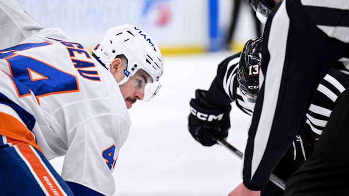 Feb 5, 2026; Newark, New Jersey, USA; New York Islanders center Jean-Gabriel Pageau (44) awaits a face off against New Jersey Devils center Nico Hischier (13) in the second period at Prudential Center. Mandatory Credit: John Jones-Imagn Images