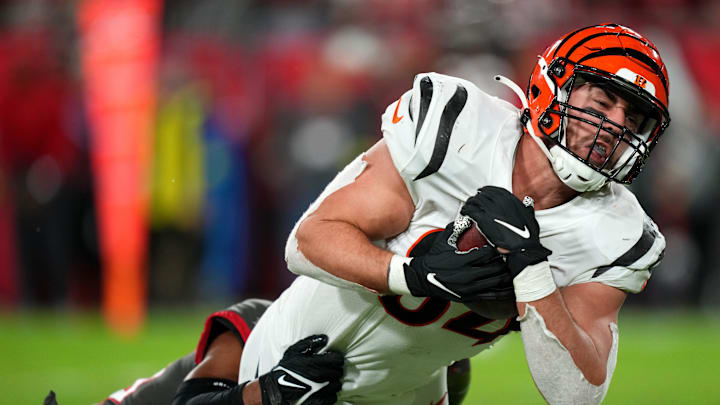 Cincinnati Bengals tight end Mitchell Wilcox (84) is tackled after completing a catch in the fourth