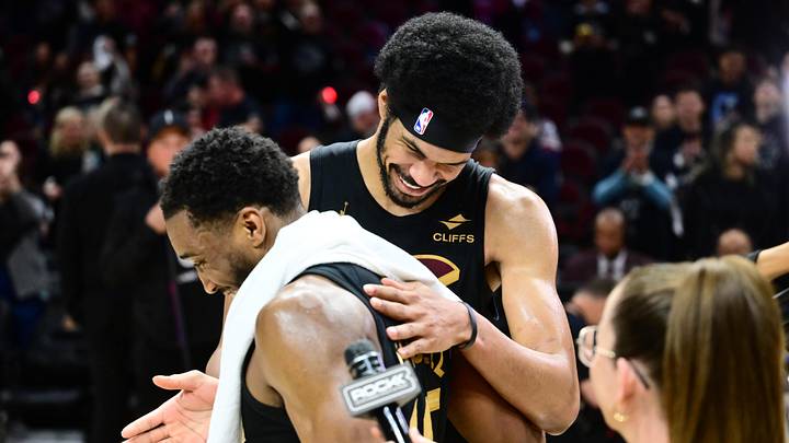 May 3, 2026; Cleveland, Ohio, USA; Cleveland Cavaliers guard Donovan Mitchell (45) hugs Cleveland Cavaliers center Jarrett Allen (31) after game seven against the Toronto Raptors In the first round of the 2026 NBA Playoffs at Rocket Arena. Mandatory Credit: Ken Blaze-Imagn Images